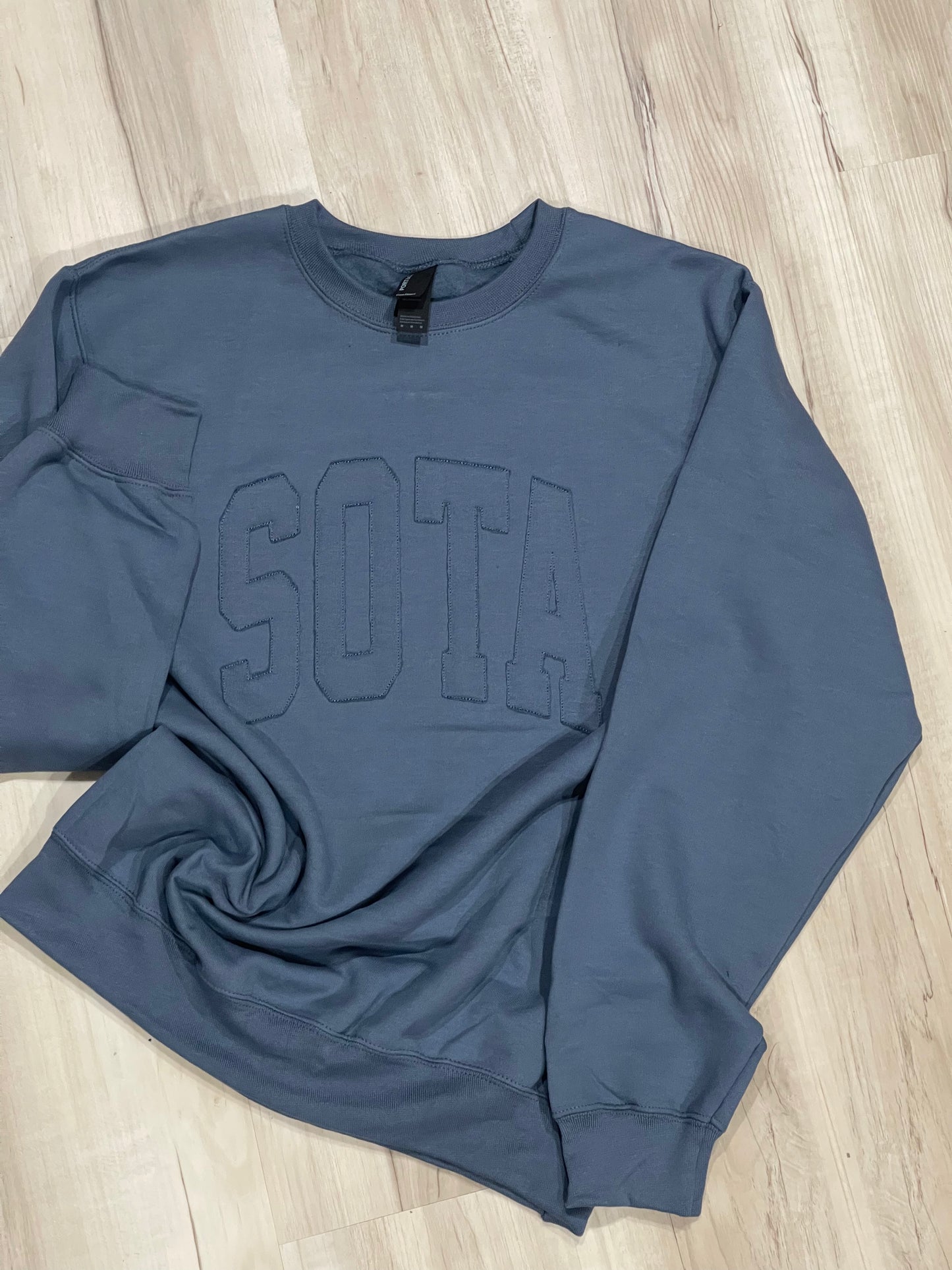 Tone On Tone Rough Edge Embroidered Minnesota Crewneck